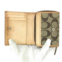 画像をギャラリービューアに読み込む, コーチ COACH シグネチャー柄 2つ折り財布 パスケース付き ブラウン【中古】