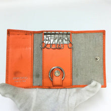 画像をギャラリービューアに読み込む, ジミーチュウ Jimmy Choo NEPTUNE 6連キーケース クリスタル スタースタッズ付き オレンジ【中古】
