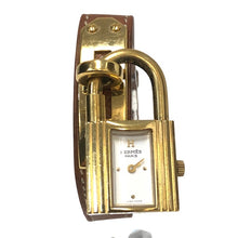 画像をギャラリービューアに読み込む, HERMES エルメス ケリーウォッチ 腕時計 ゴールド ブラウン OZ刻印 クオーツ ホワイト文字盤【中古】 レディース