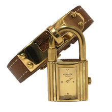 画像をギャラリービューアに読み込む, HERMES エルメス ケリーウォッチ 腕時計 ゴールド ブラウン 〇U刻印 クオーツ ゴールド文字盤【中古】 レディース