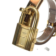 画像をギャラリービューアに読み込む, HERMES エルメス ケリーウォッチ 腕時計 ゴールド ブラウン 〇U刻印 クオーツ ゴールド文字盤【中古】 レディース